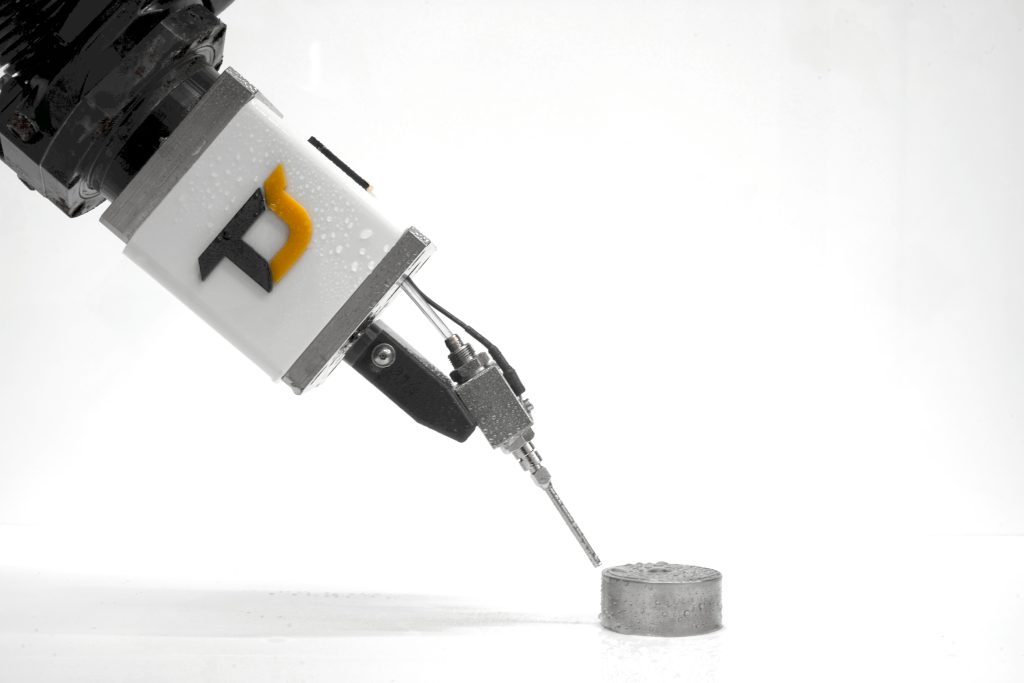 Deburring of a component by Texture Jet