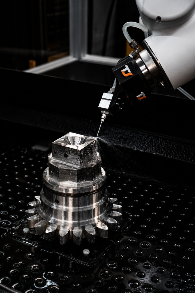 TextureJet Cobot Demo Cell working on a metal component